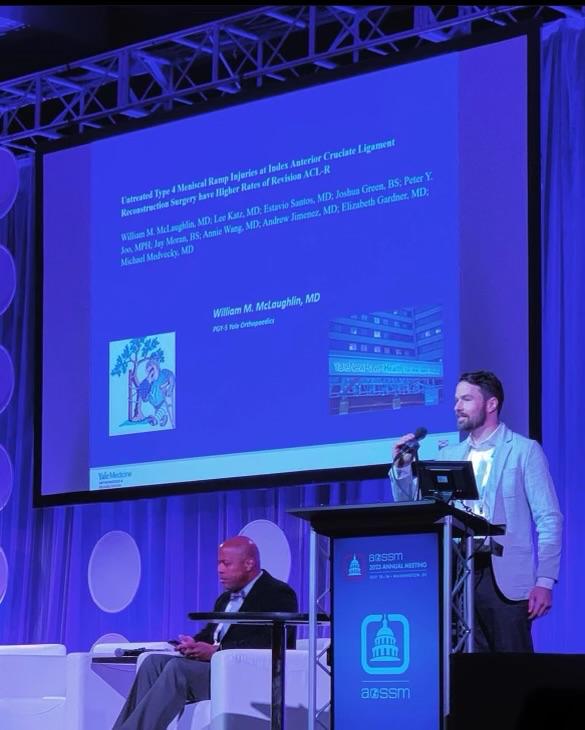 Dr. McLaughlin presenting research at the AOSSM Annual Meeting